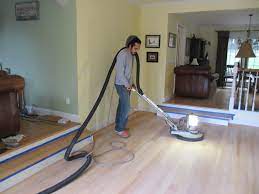 When should you stop sanding floors?